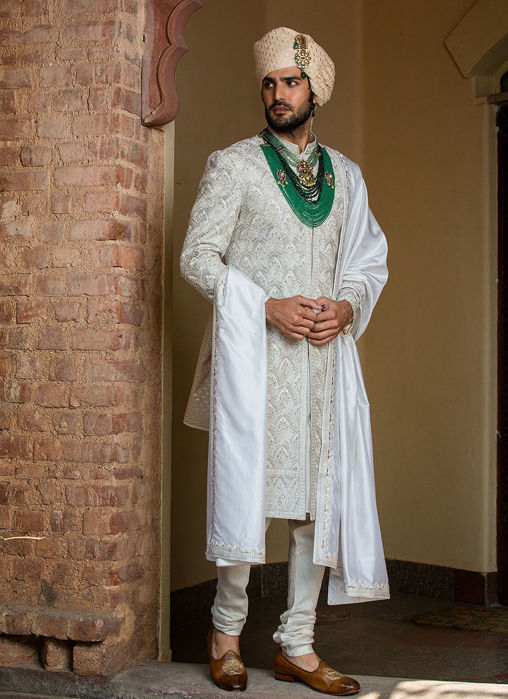 IVORY ACHKAN AND BELT KURTA AND CHURIDAR