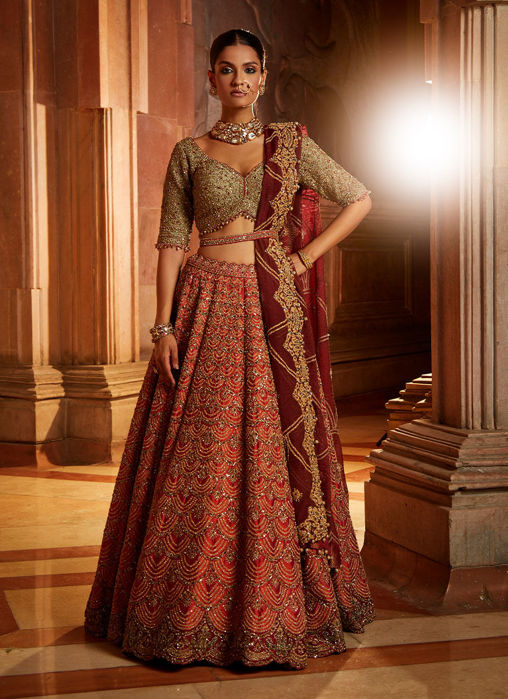 Picture of Rust Lehenga with Olive Choli